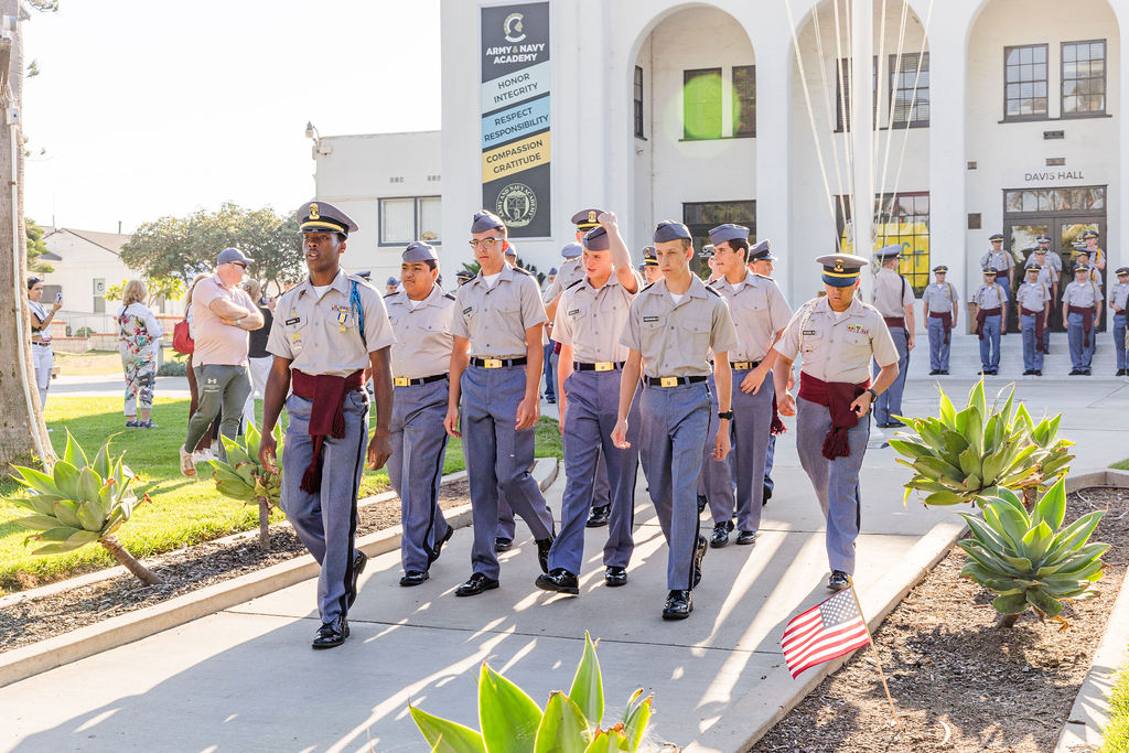 Army and Navy Academy cadets marching in formation past Davis Hall